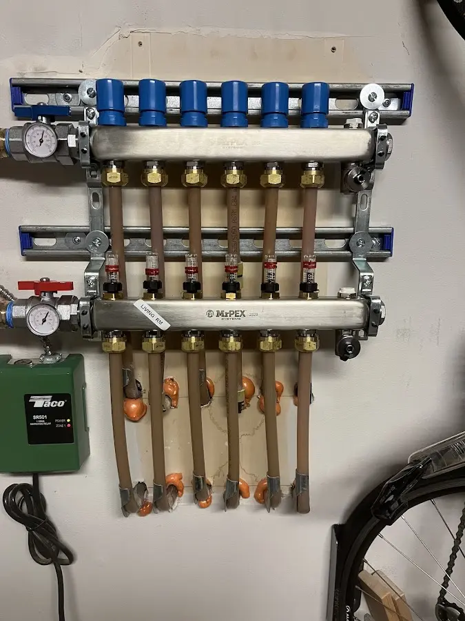 Plumber performing Gas Line Installation at a residential property in Milford